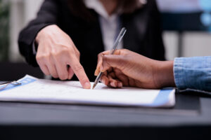 First notary job pointing at paper