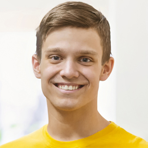 Torstin smiling for his testimonial headshot
